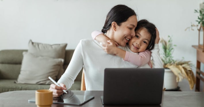 Mother and daughter embracing